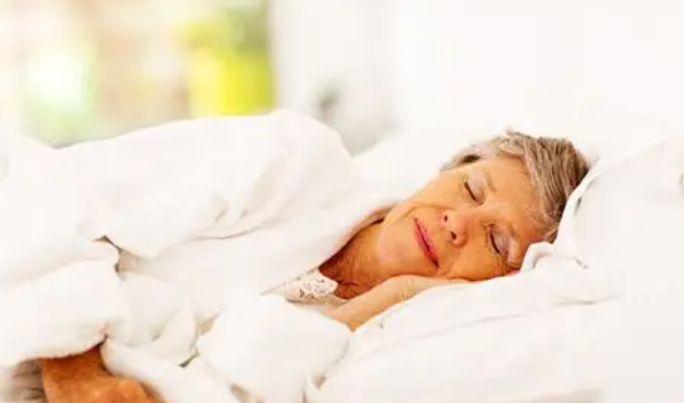 The elderly sleep on a memory foam pillow