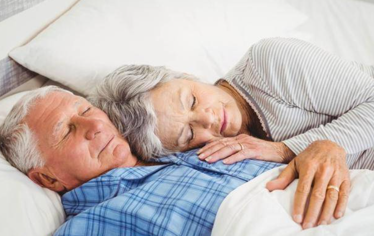 two elderly people slept on memory foam pillows